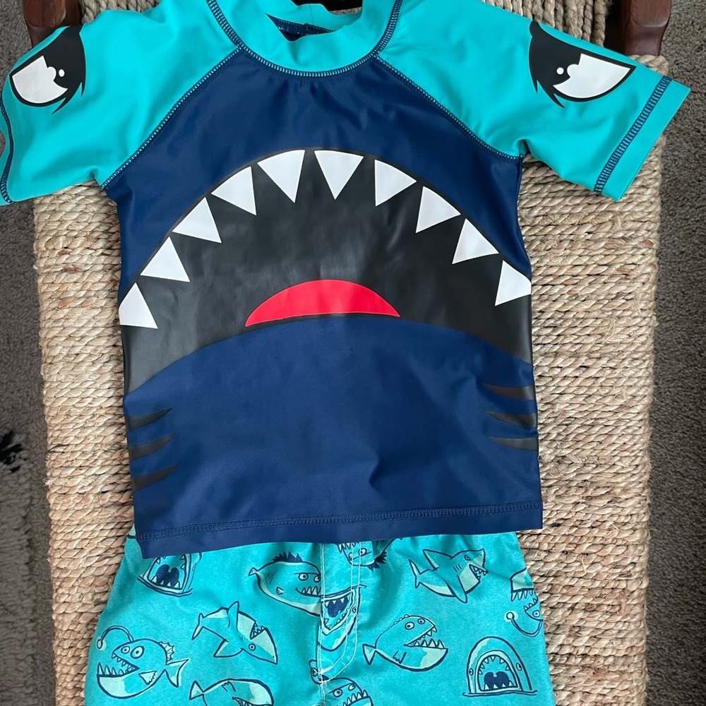 Rashguard and swim trunks